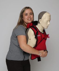 Heather Marie Bird Director of HMB Training Services performing abdominal thrust on a manikin, first aid training in Liverpool Manchester and Sheffield